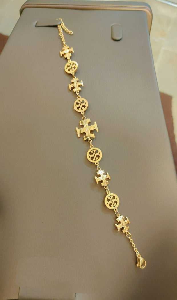 Tory Burch and Lv bracelet