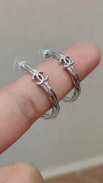 CHANEL Earrings with embossed stamp