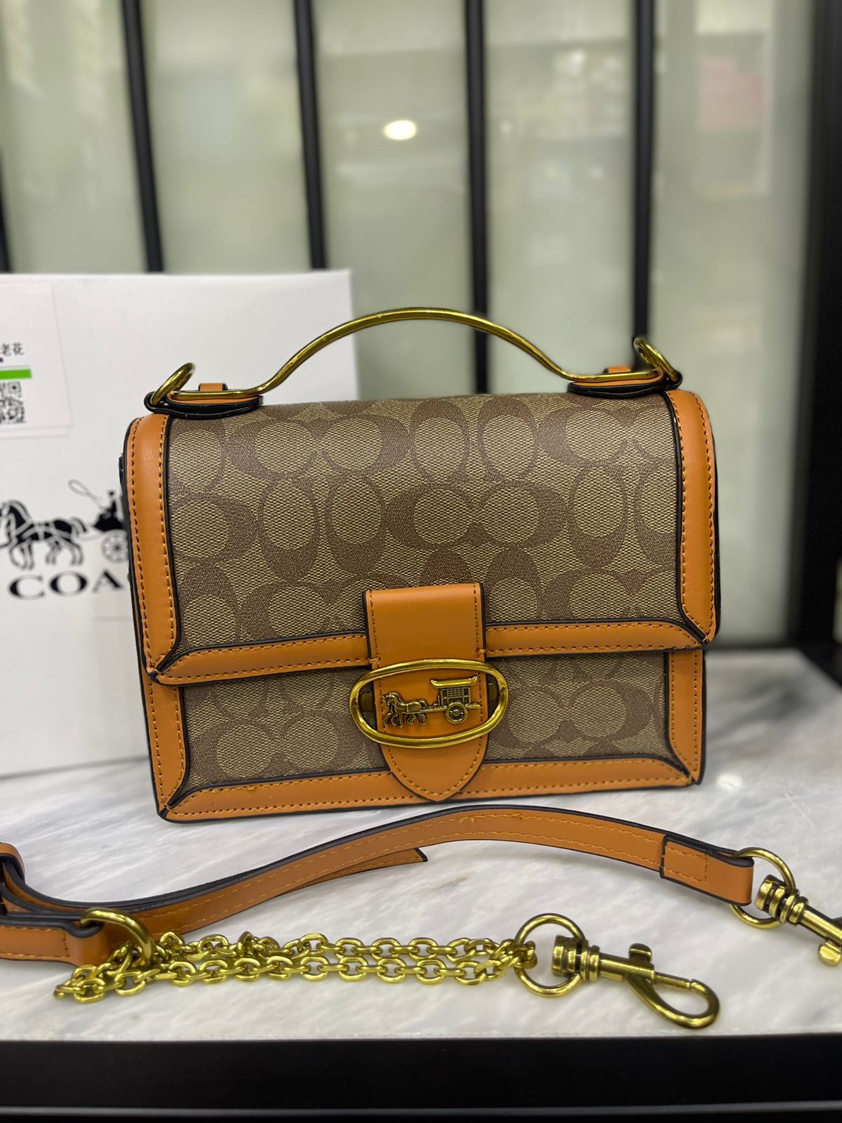 COACH Riley Top Handle Bags