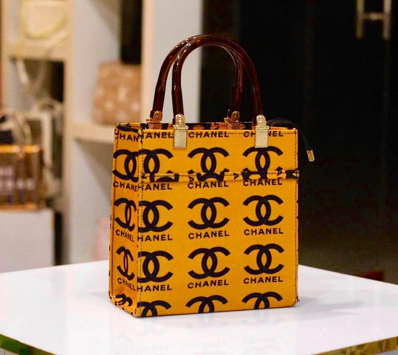 Chic Embossed Mini TT Handbag