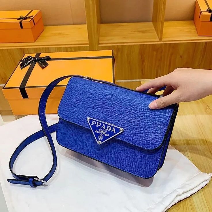 Prada Flies Cross Body Bags